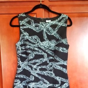 Super cute zip up the back, sleeveless dress